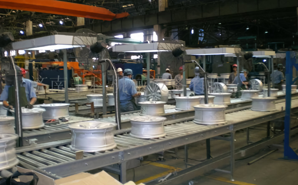 Wheel inspection conveyor system