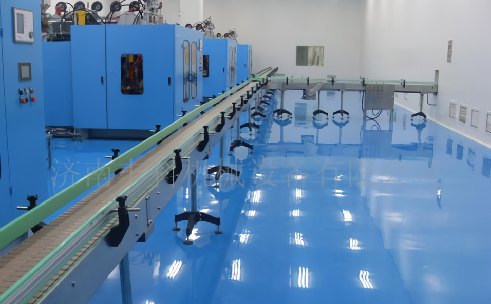 Pharmaceutical blow barrel conveyor system