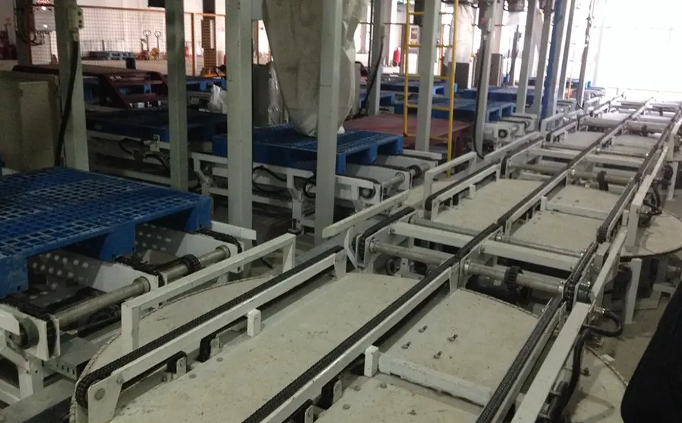 Ton bag pallet conveyor system